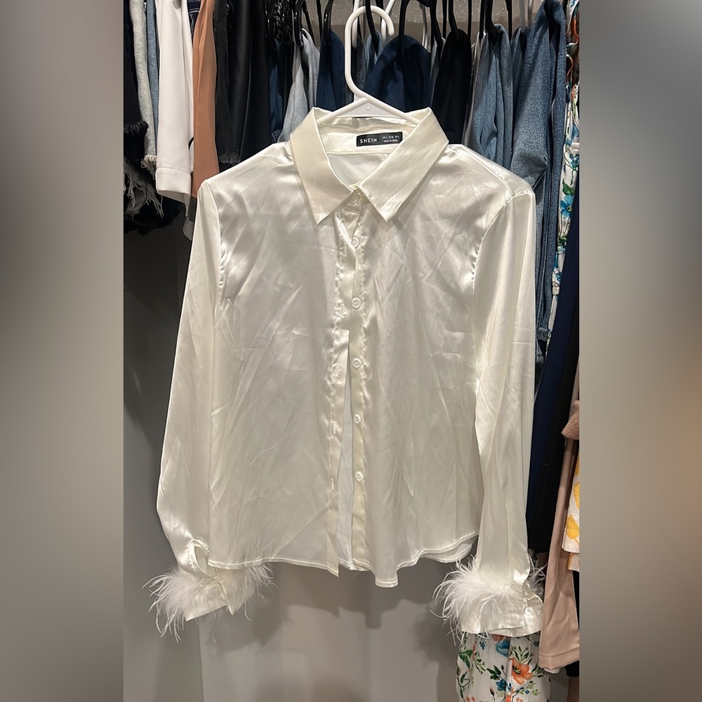 White button down top with feather cuff sleeves
